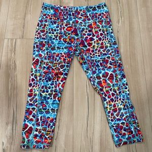 CVG capri leggings, size l, multi cheetah pattern.